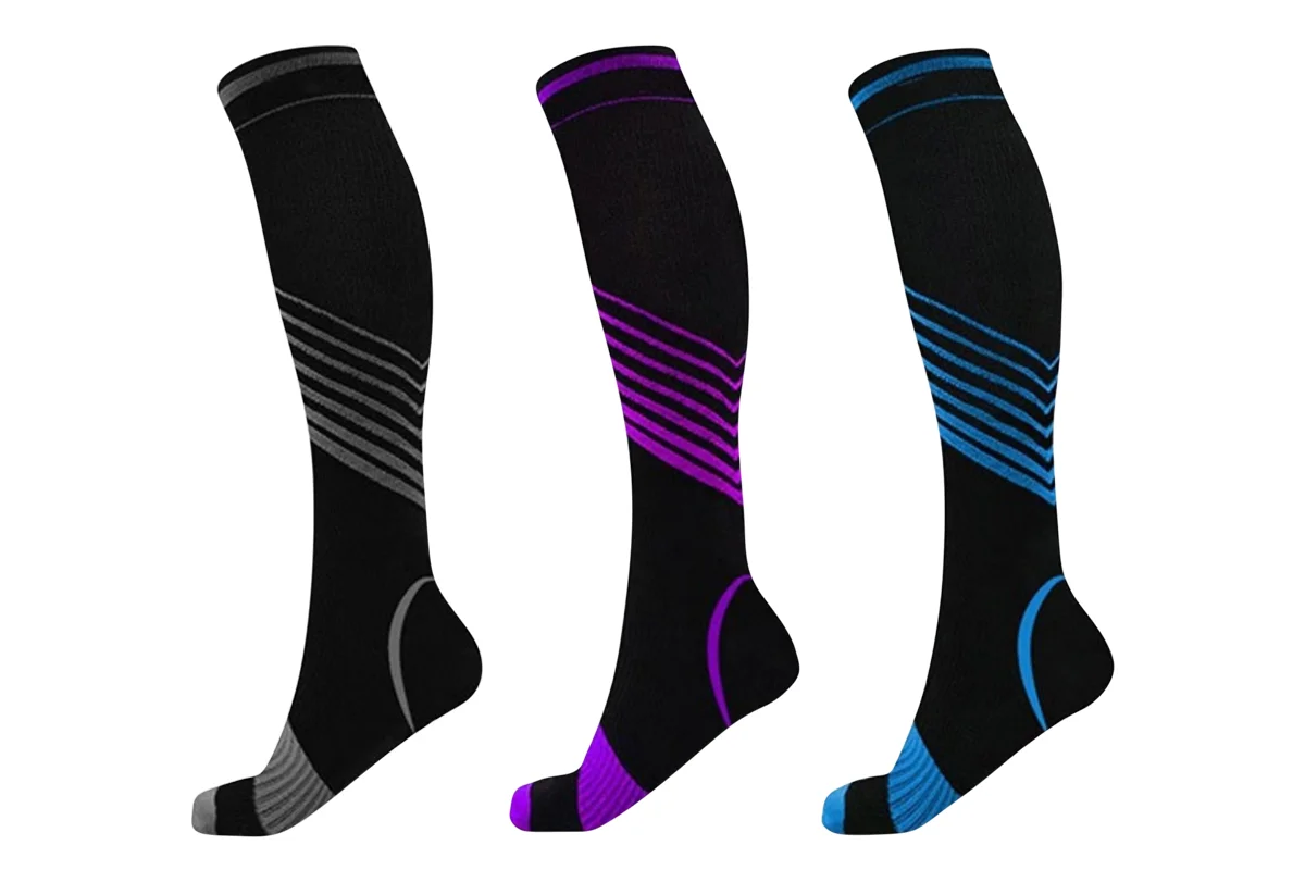 Socks before and after color correction, showcasing a vibrant explosion of many different colors.